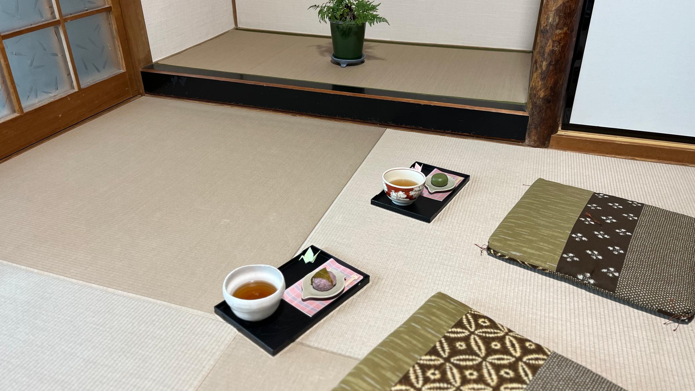 Japanese tea and wagashi served in a traditional tatami room during a private Reiki session near Osaka